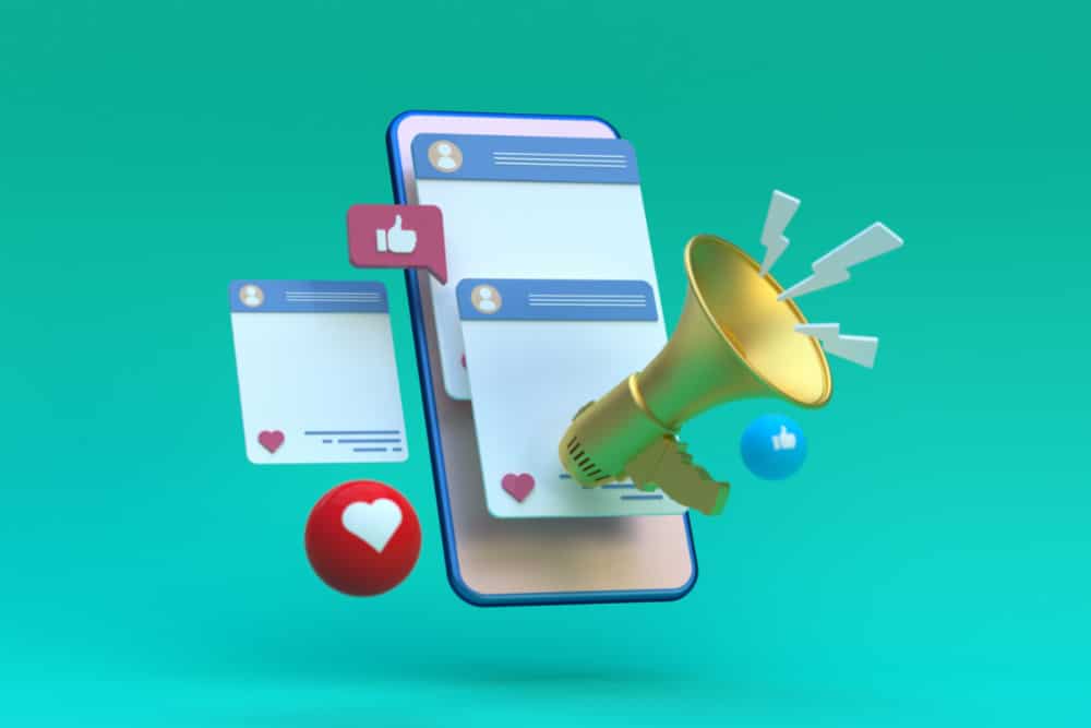 Animation of a smartphone with social media posts and likes popping out with a tiny gold megaphone in front.